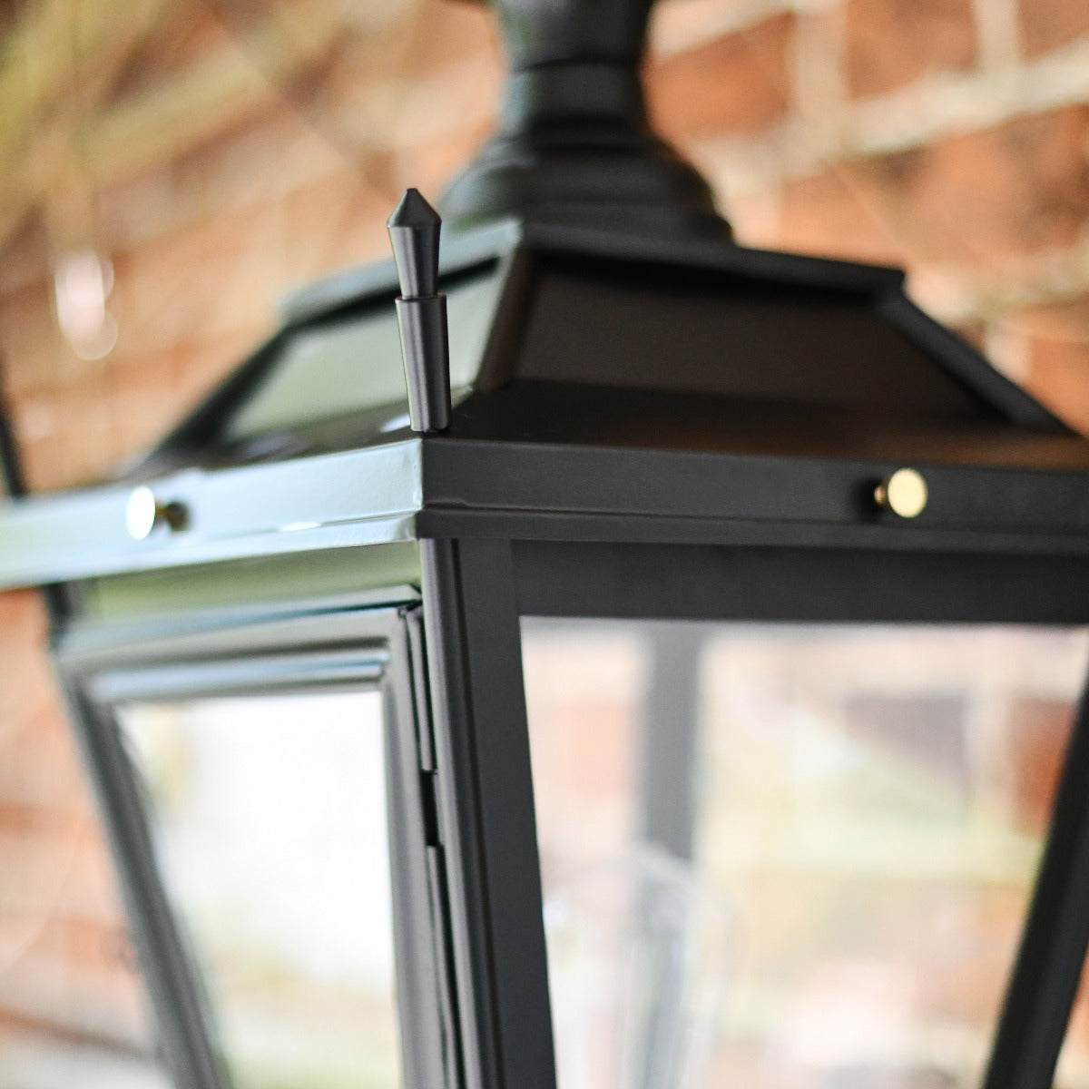 Close Up Of Lantern Finial On Dorchester Wall Light