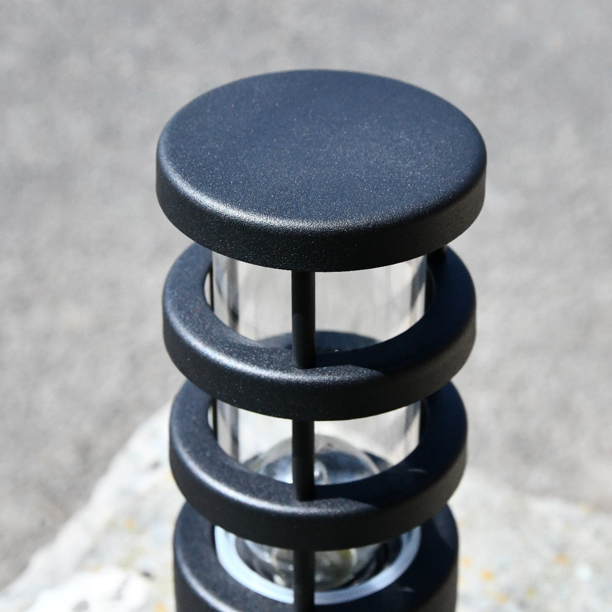 Close Up of Modern Black Stainless Steel Pillar Light