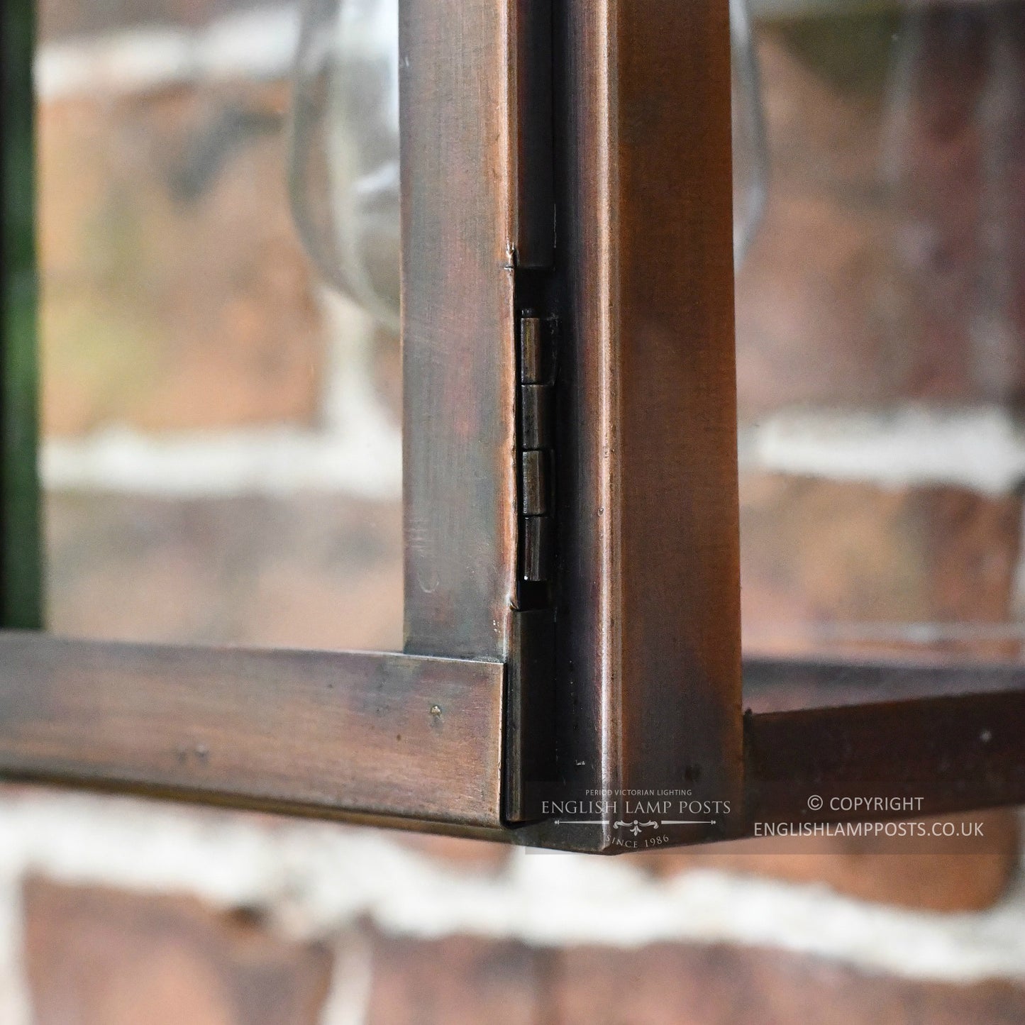 Close Up Of Opening Door On Antique Copper Wall Light