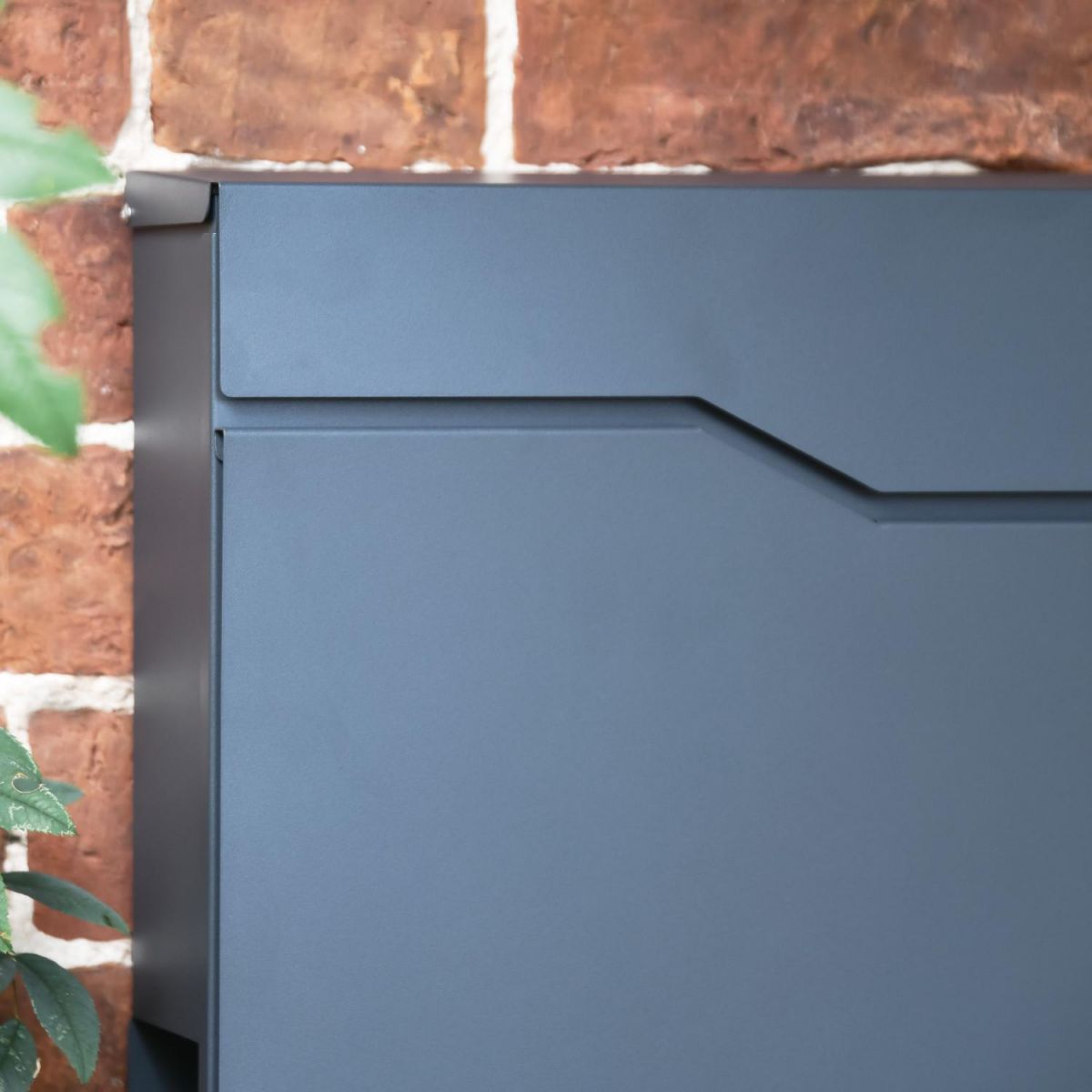 Close up of the 'Paxton' Granite Grey Wall Mounted Post And Newspaper Holder