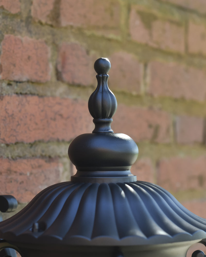 Close up of the ornate centrepiece on the apex of the lantern 