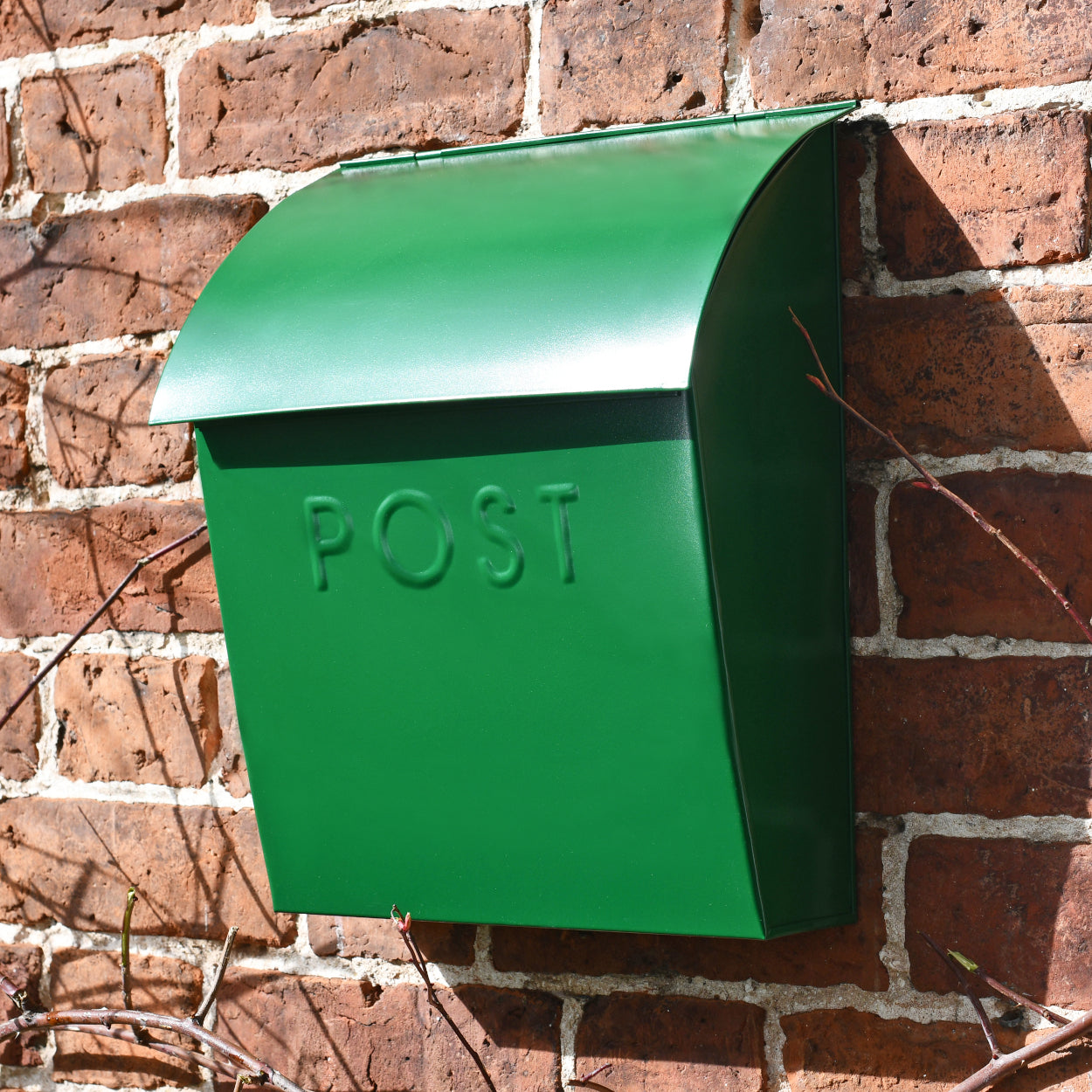 Contemporary Green Post Box With Lock on brick wall