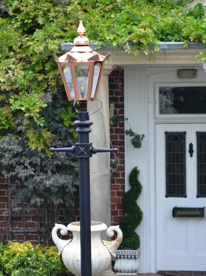 Copper hexagonal lamp post on private drive way