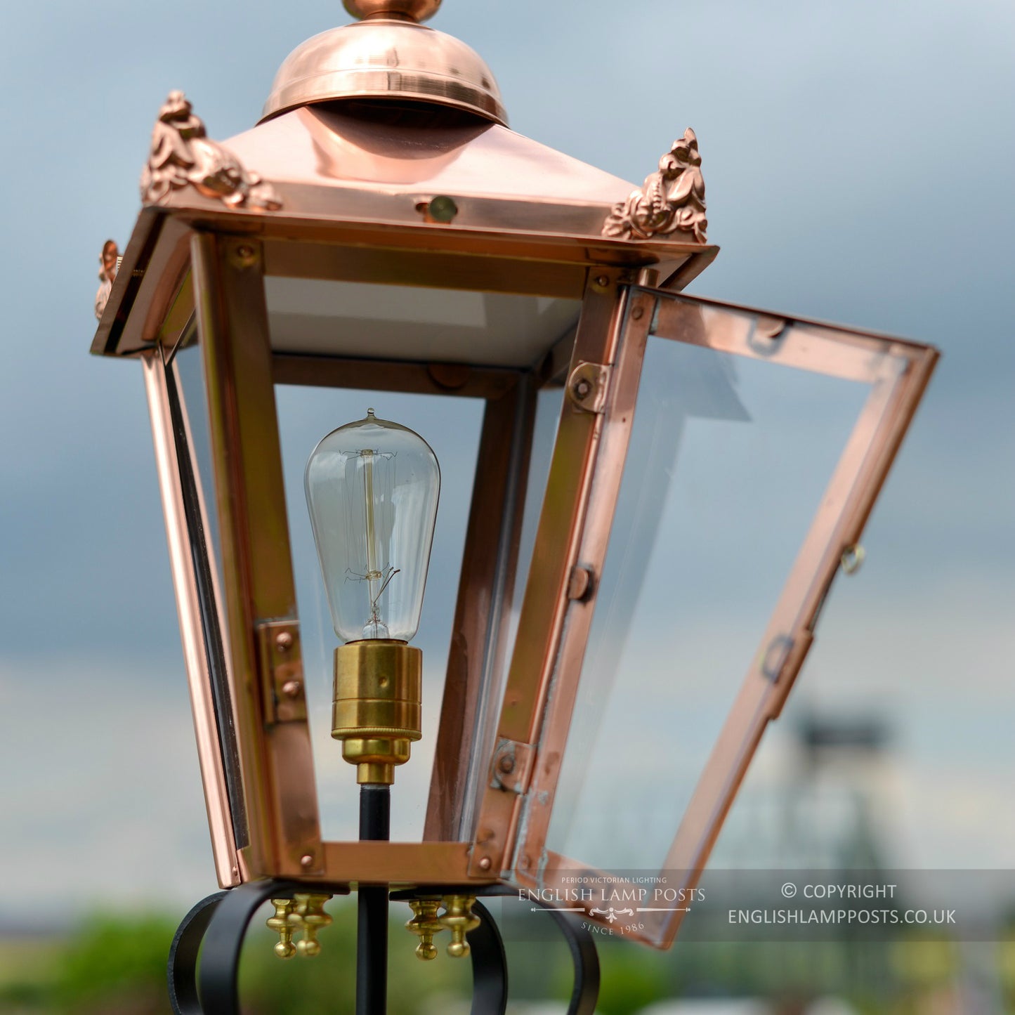 Copper Victorian Lantern On Black Pillar Mount With Opening Door