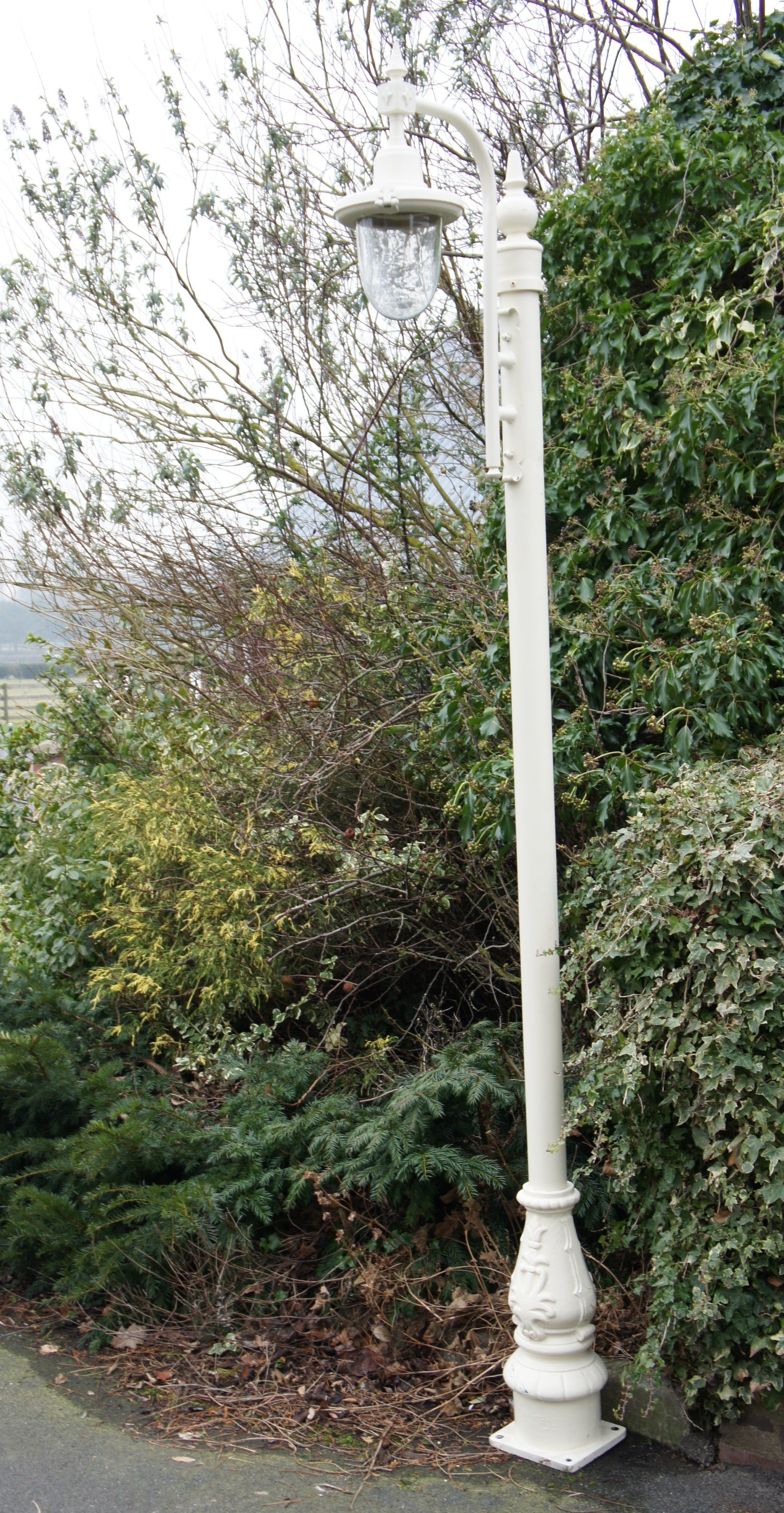 St Florent Swan Neck Lamp Post on a driveway 