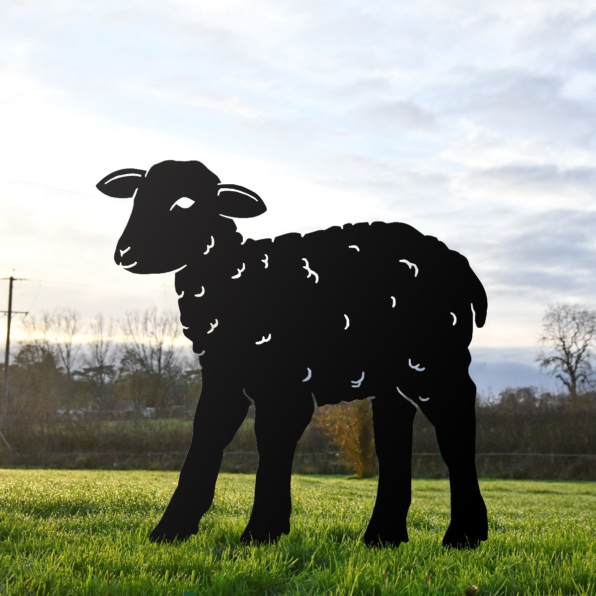Black Young Curly Lamb Garden Sheet Steel Silhouette In Garden Setting