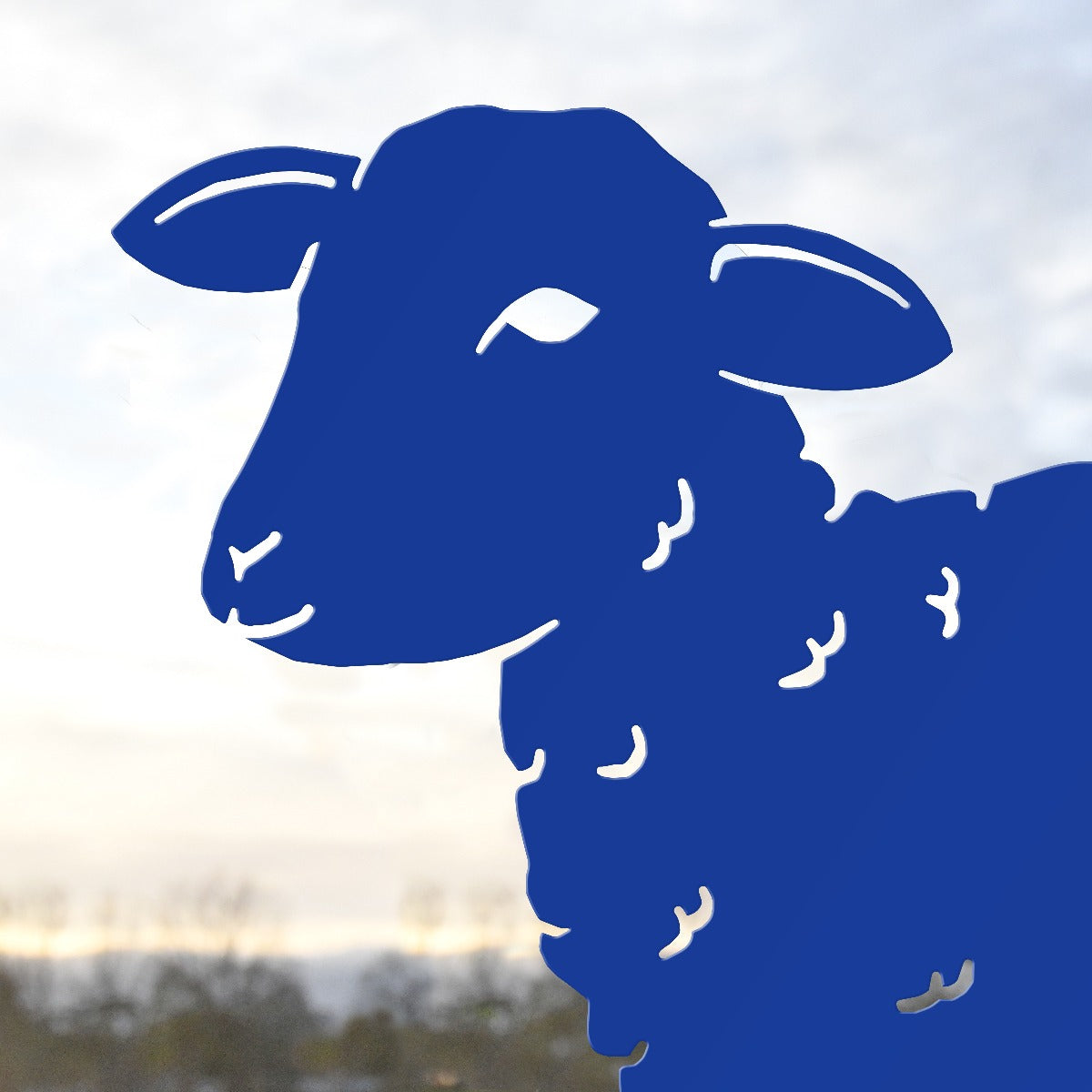 Young Curly Lamb Garden Sheet Steel Silhouette In Blue Close Up