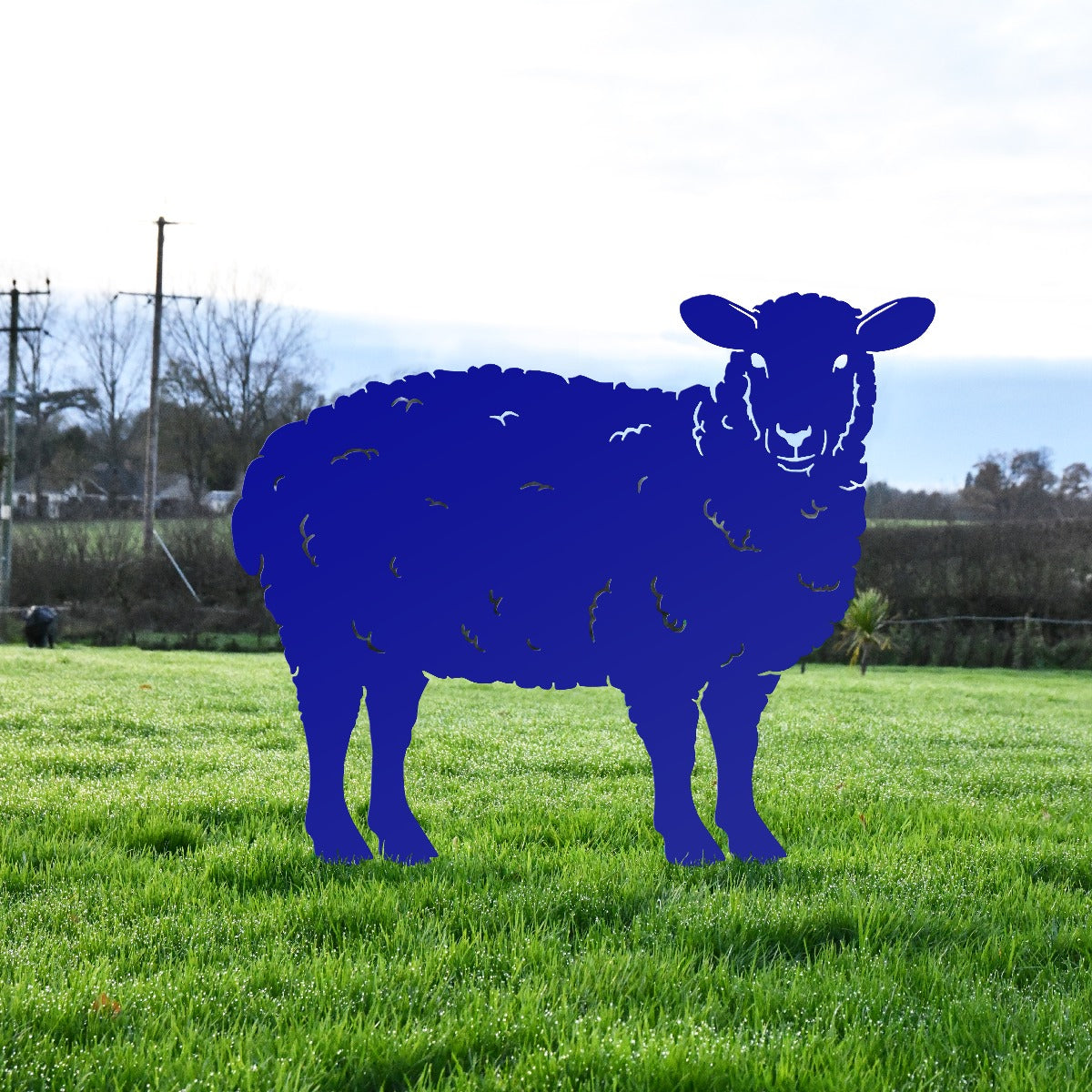 Blue Curly Sheep Sheet Steel Silhouette In Garden Setting