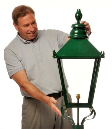 Man holding custom painted lantern
