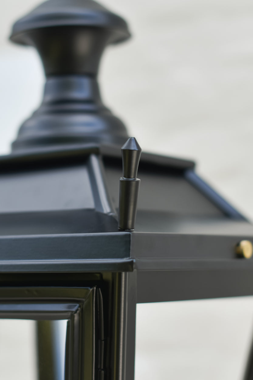 Close up of the spikes on black lantern roof 