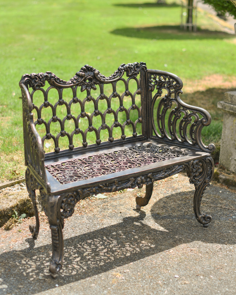 Angled view of the bronze bench