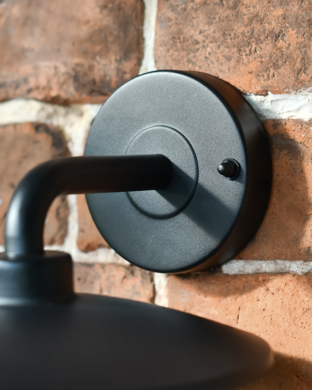 Matte black bracket of garden light