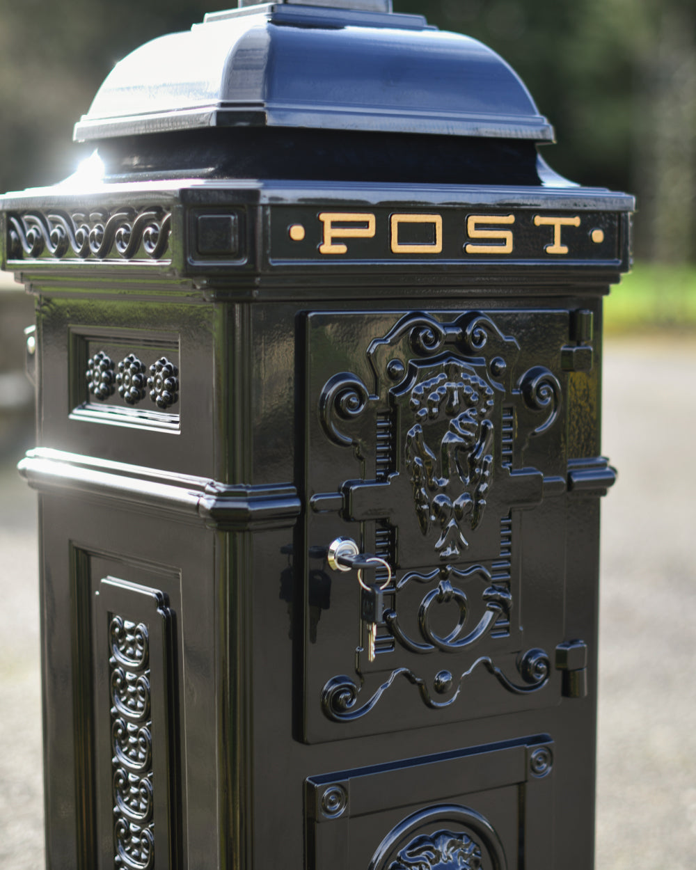 Ornate design on post box collection door