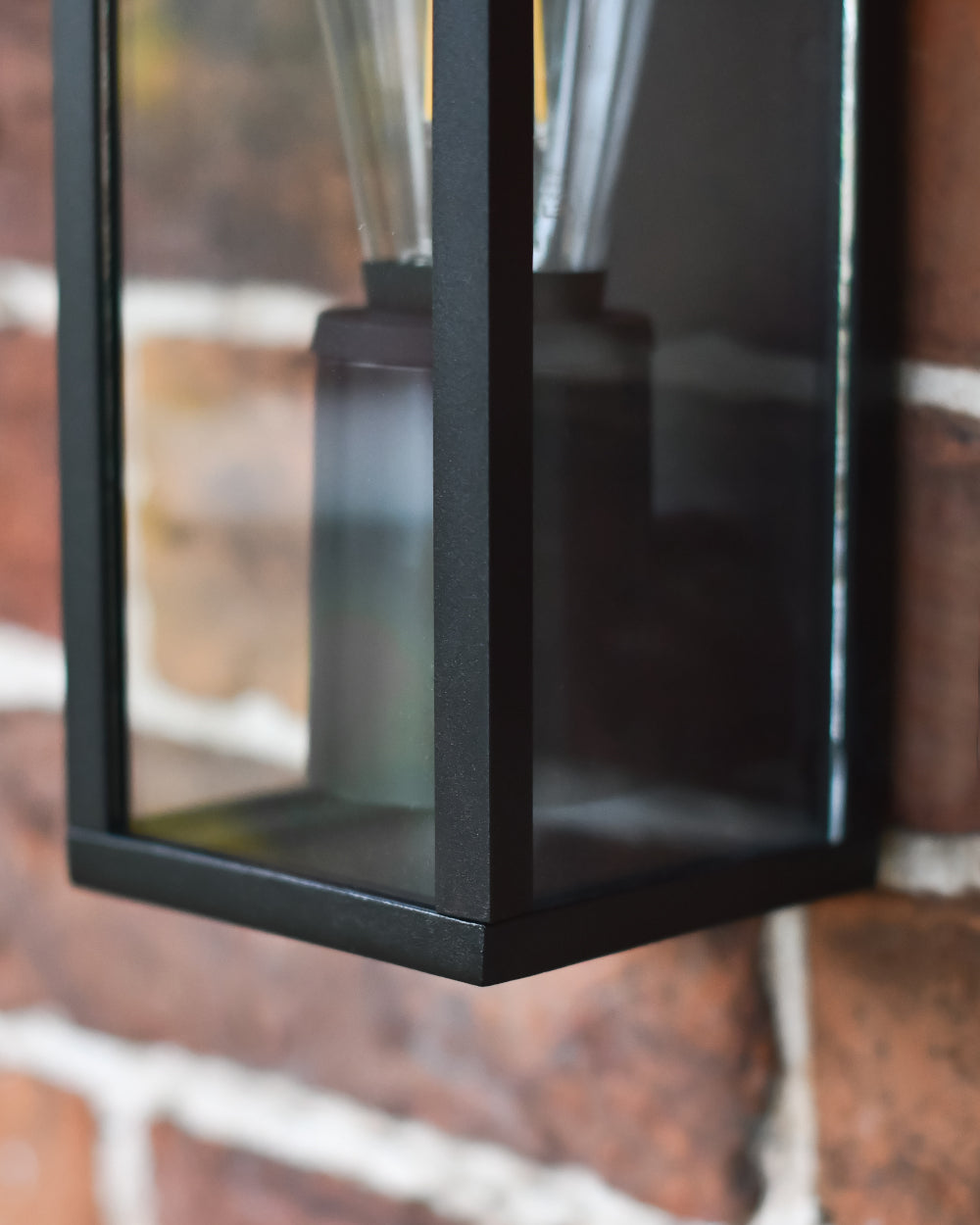 Bottom of the matte black square wall light