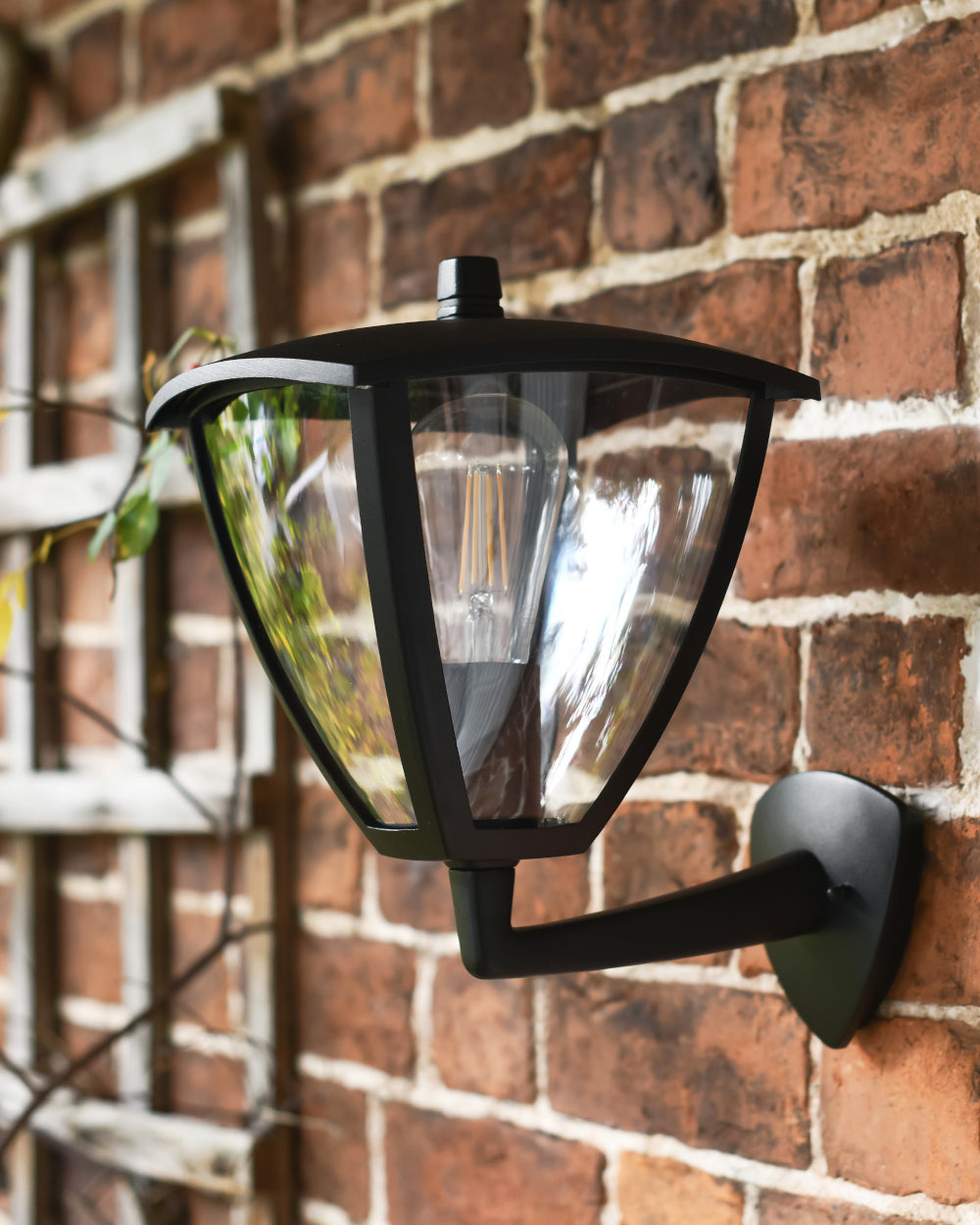 Outdoor wall light with canopied roof 