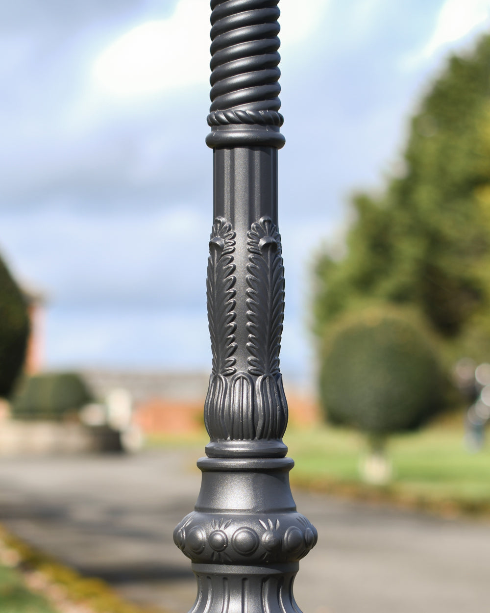 Scrolled black post 