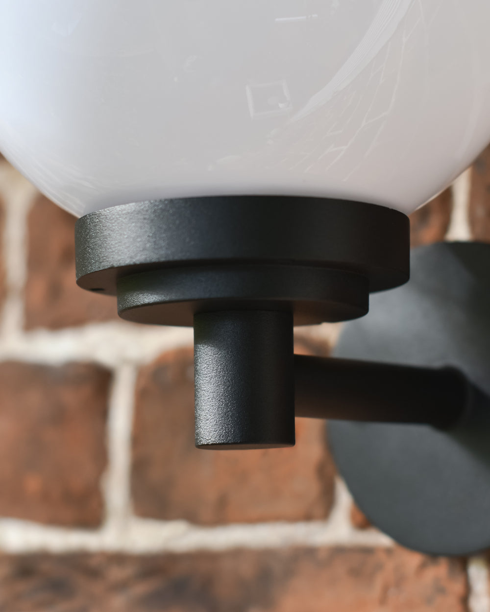 Ornate matte-black bracket 