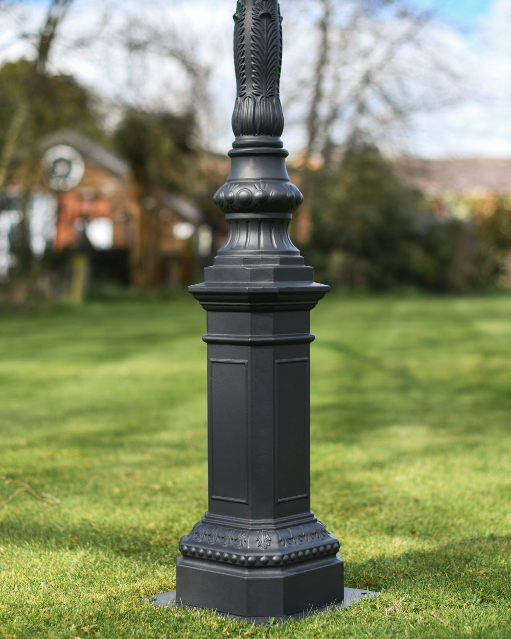 Embossed lamp post base 