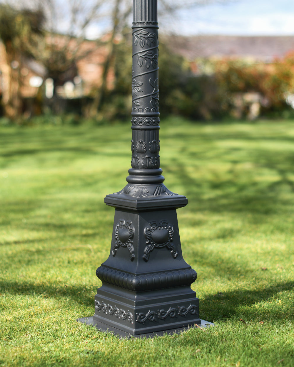 Embossed lamp post base 