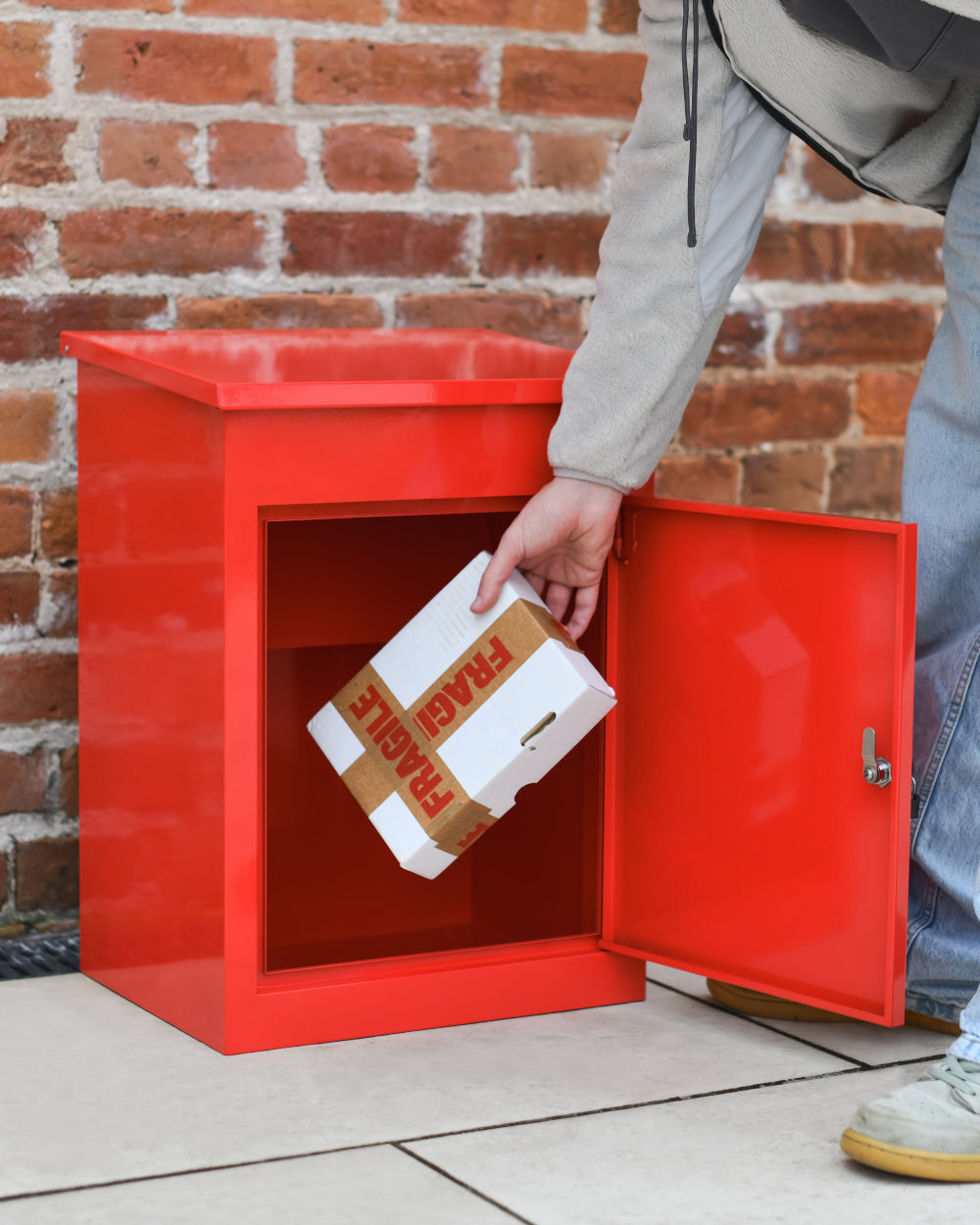 Red hinged doors on parcel box