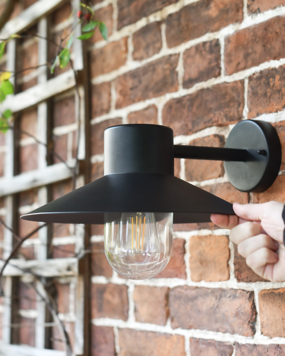 Nautical-inspired light fixed onto the wall 