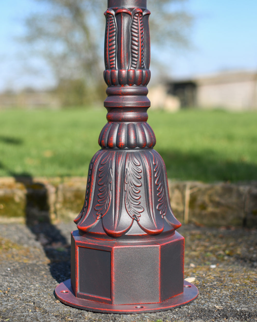 Artistic red lamp post base 