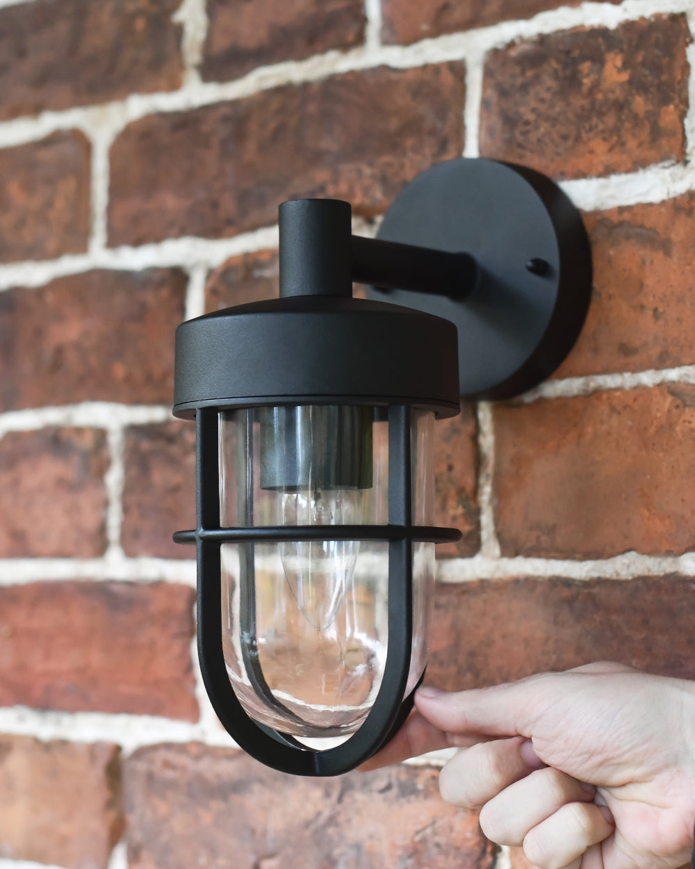 Jet-black wall light 