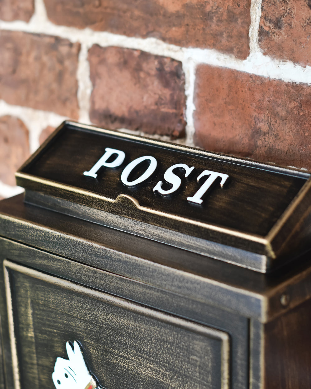 Post box with white lettering 