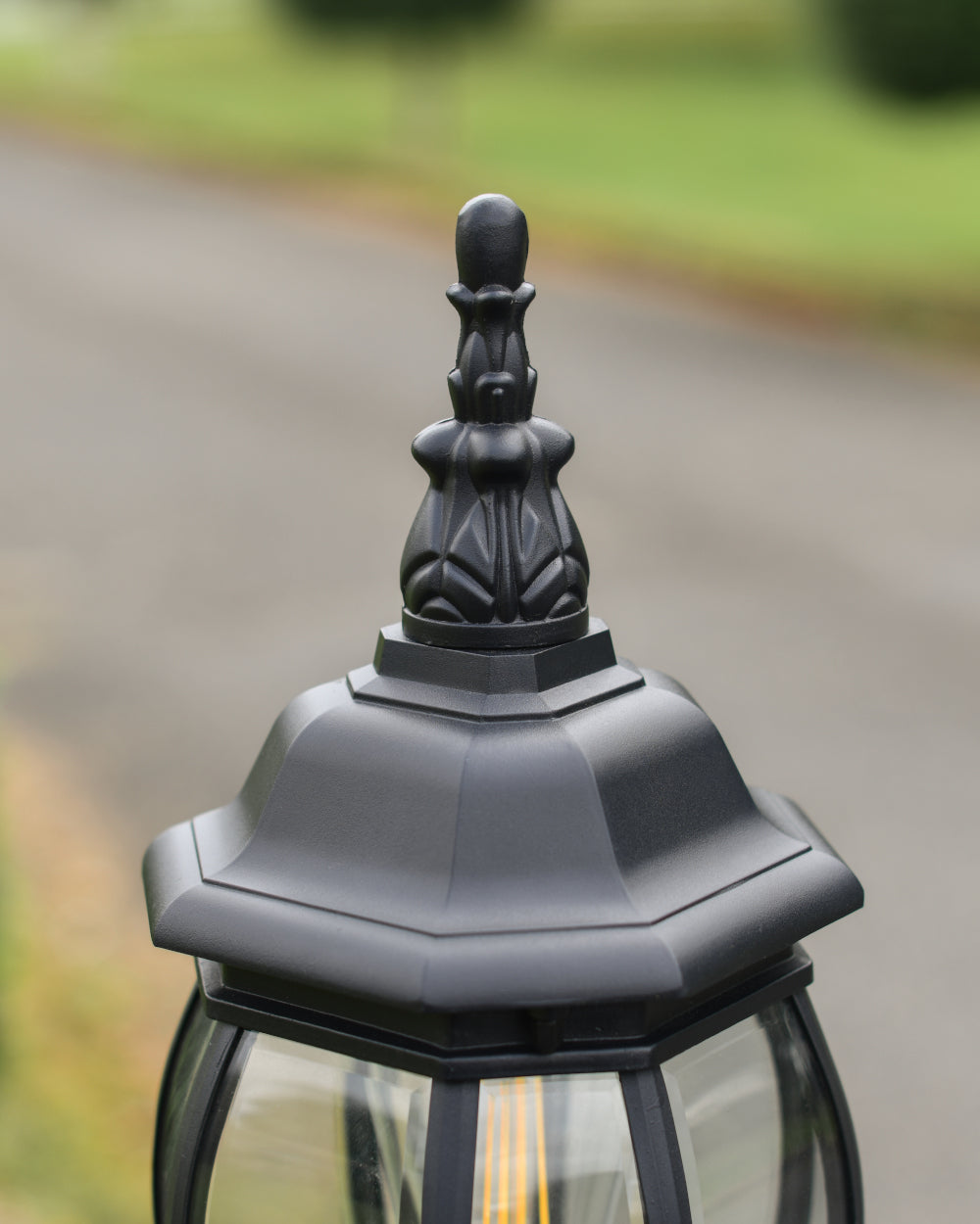 Ornate black pillar light roof 