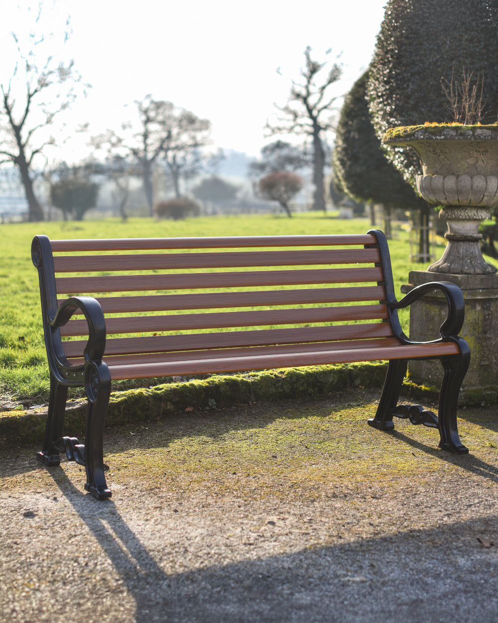 Wrought iron and wooden bench