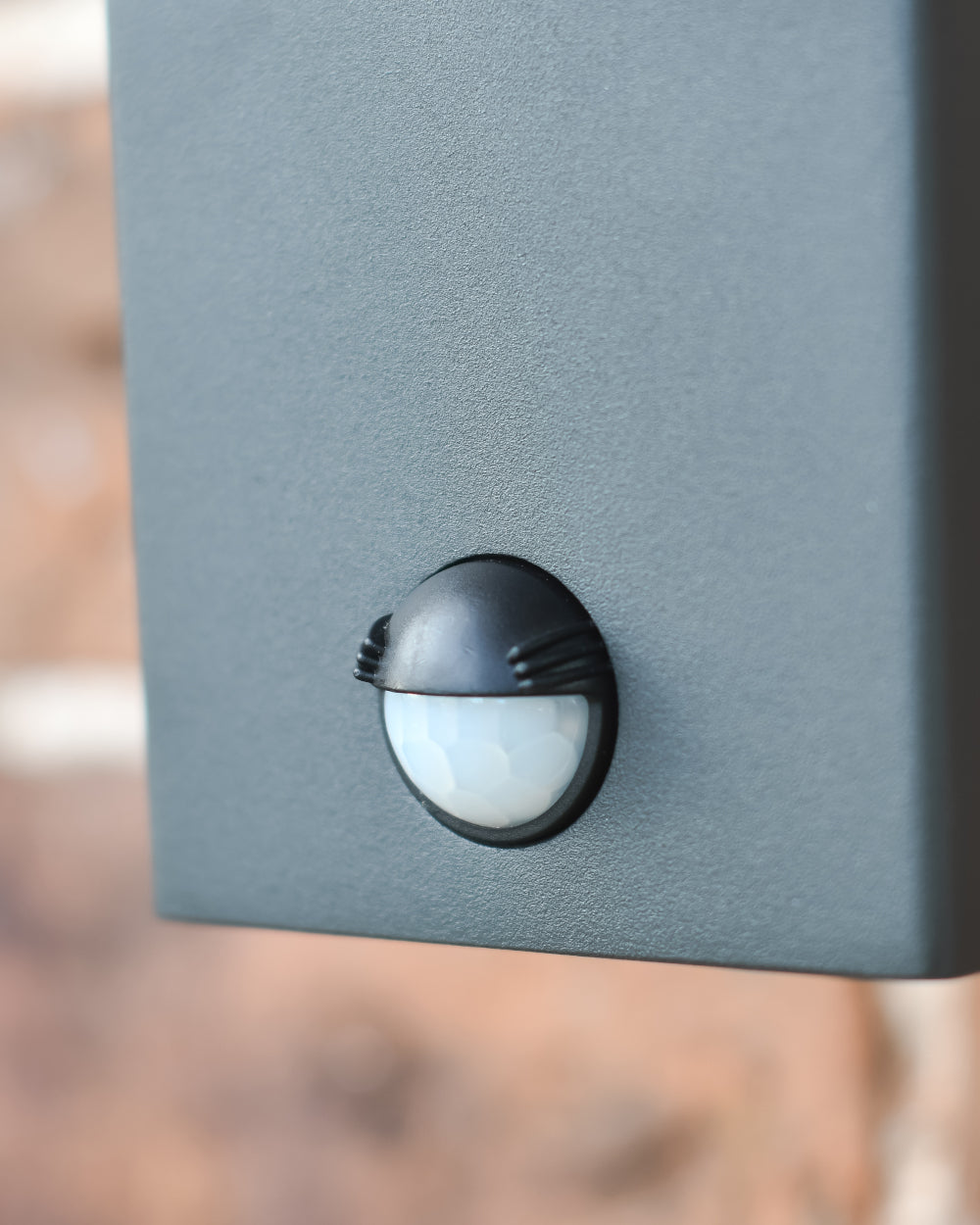 Passive infrared sensor on a cube wall light 