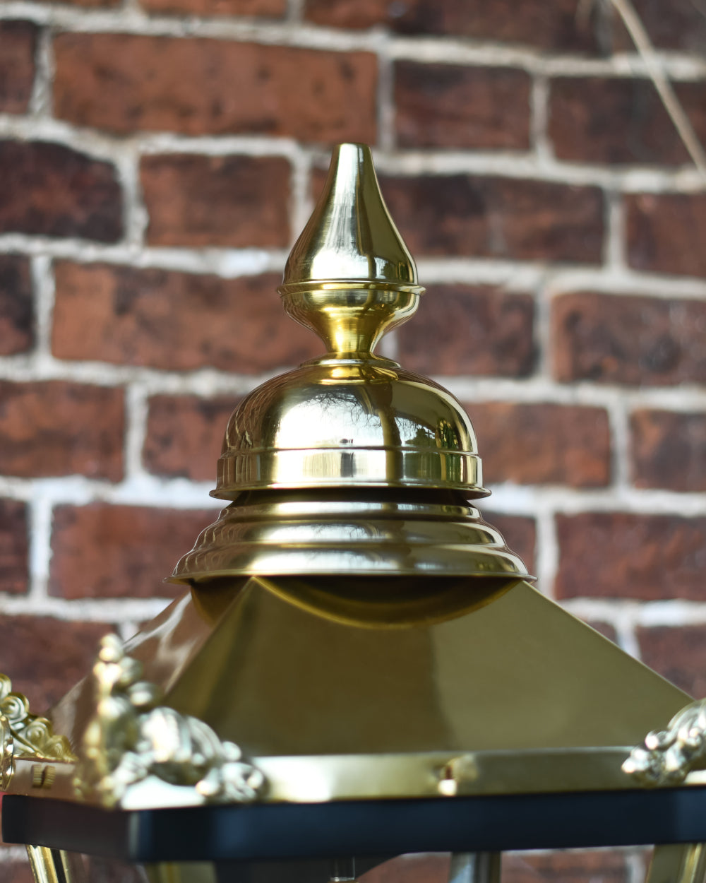 Ornate wall light top 
