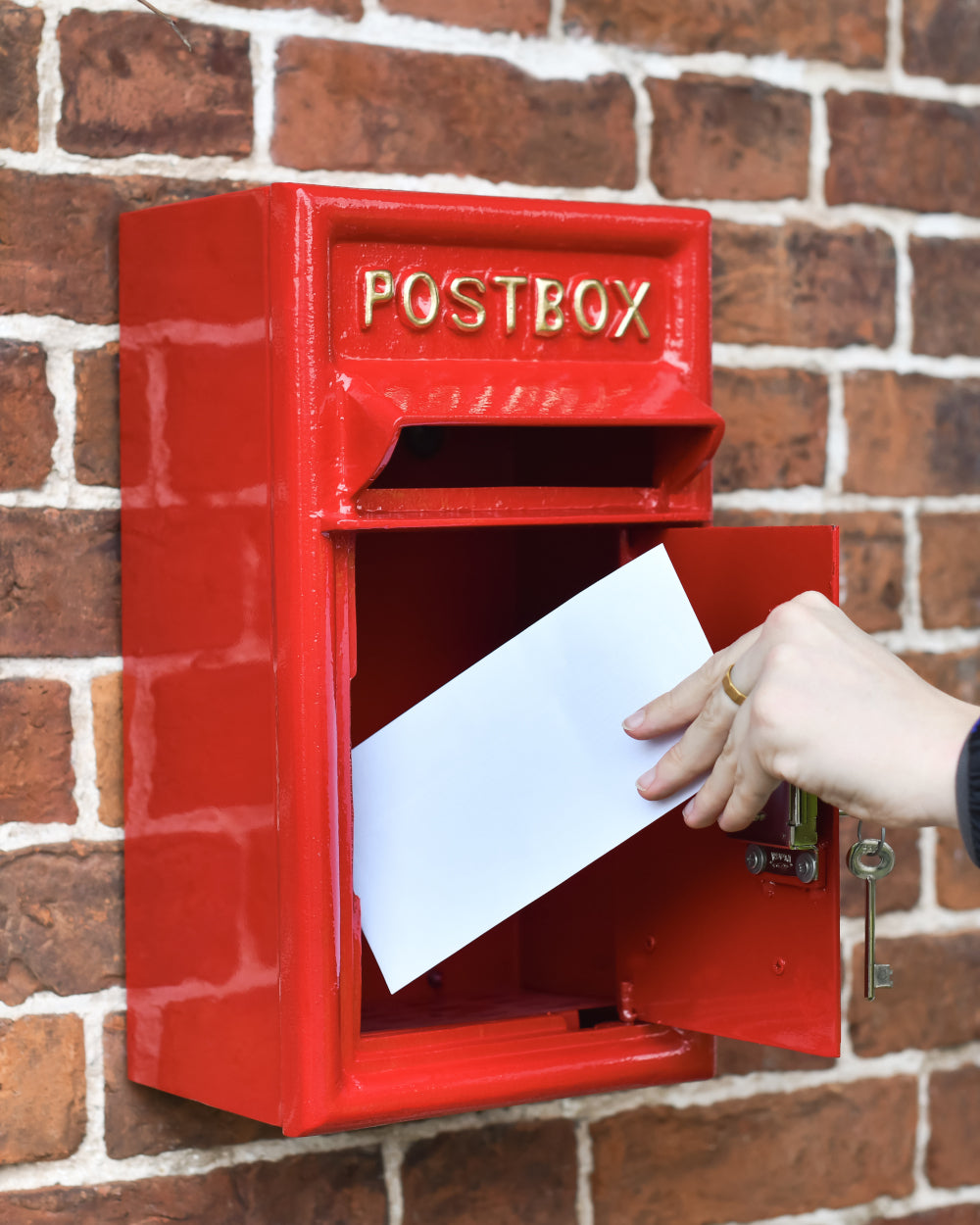 Hinged lockable post box 