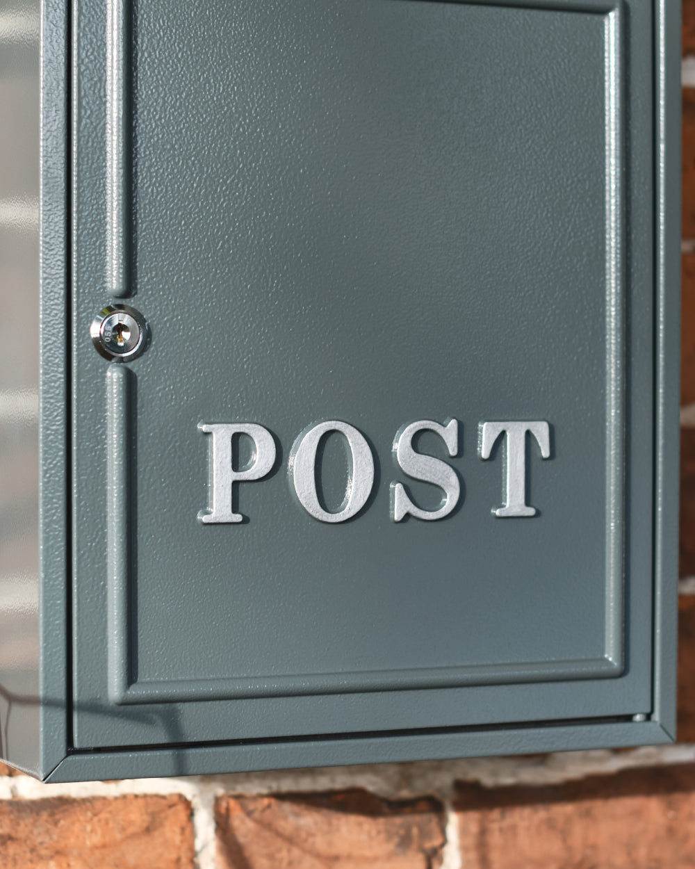Embossed silver lettering post box