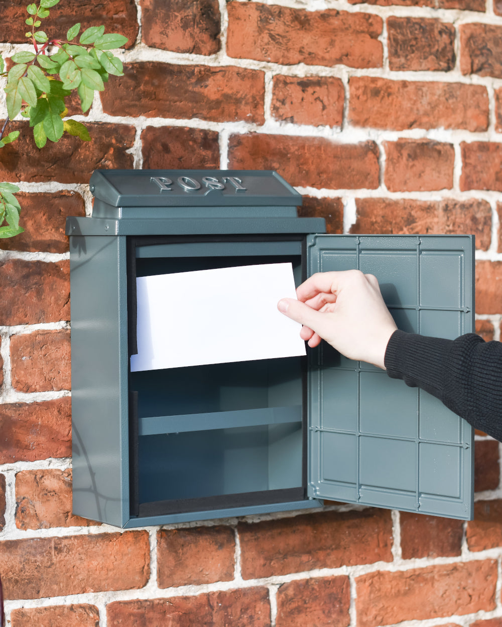 Hinged door letter box
