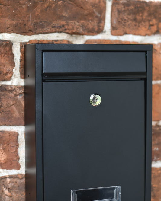 Wall mounted black post box 
