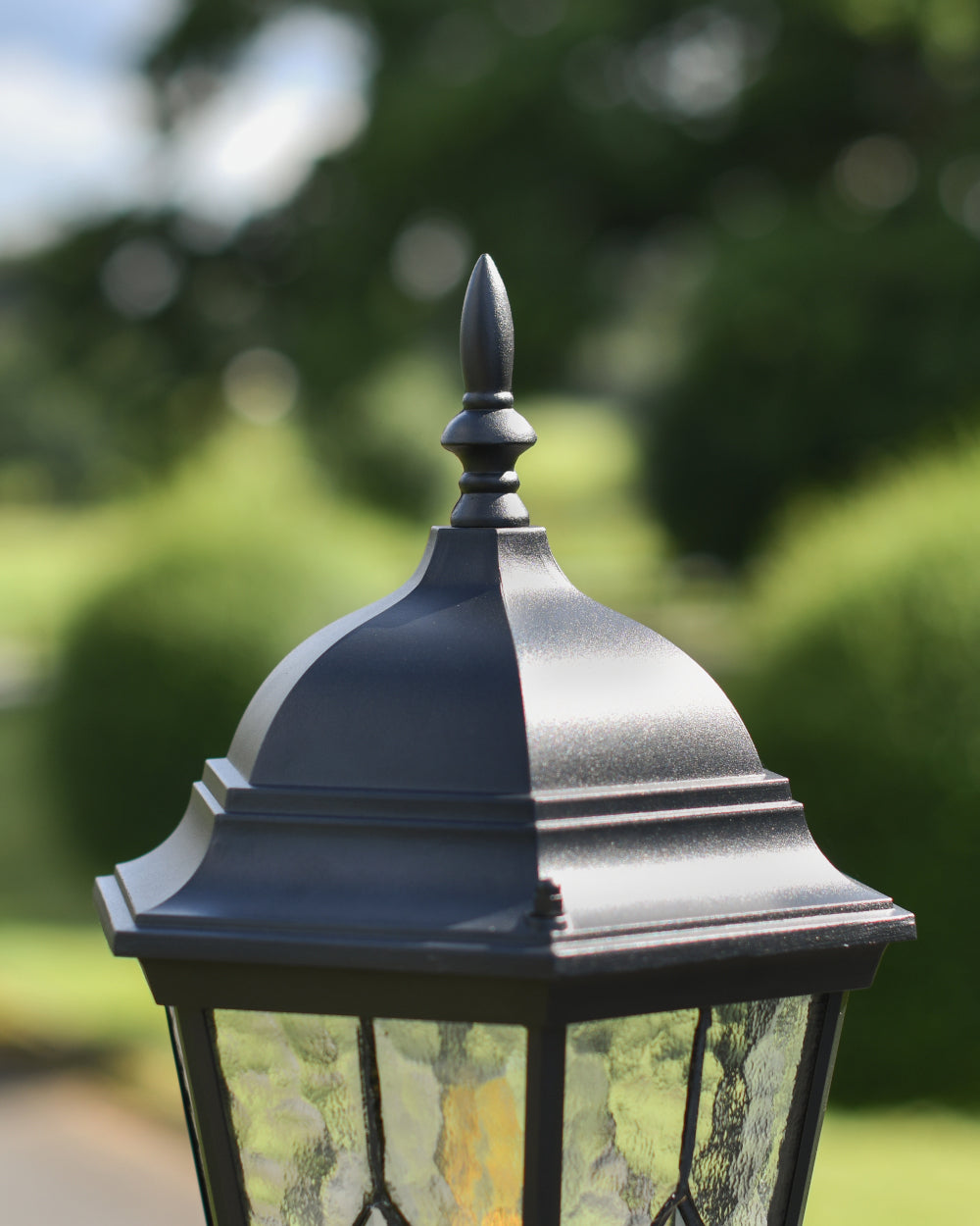 Detailed top of matte black lantern 