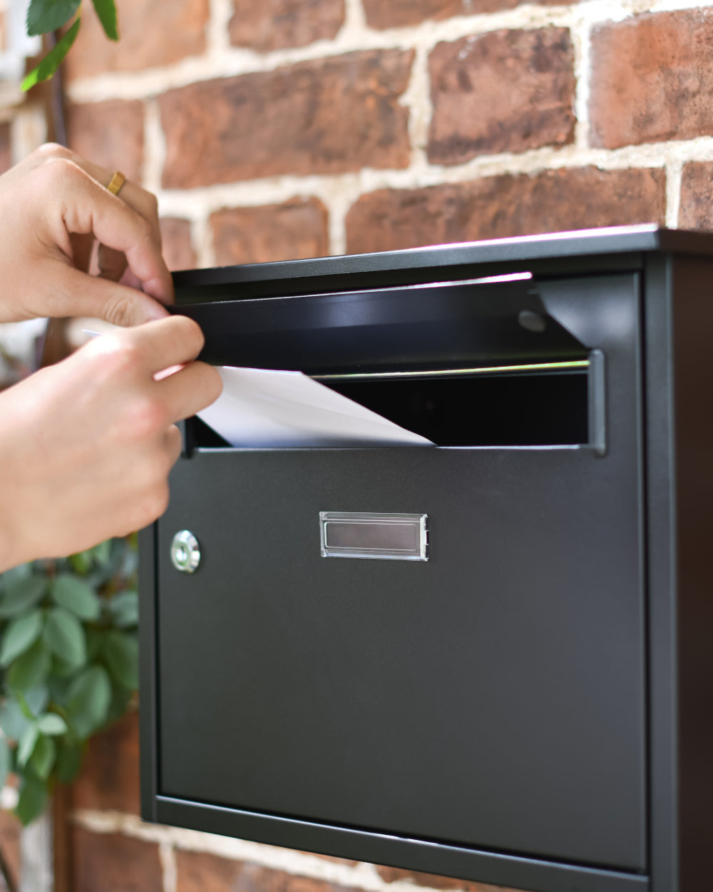 Post box with liftable flap