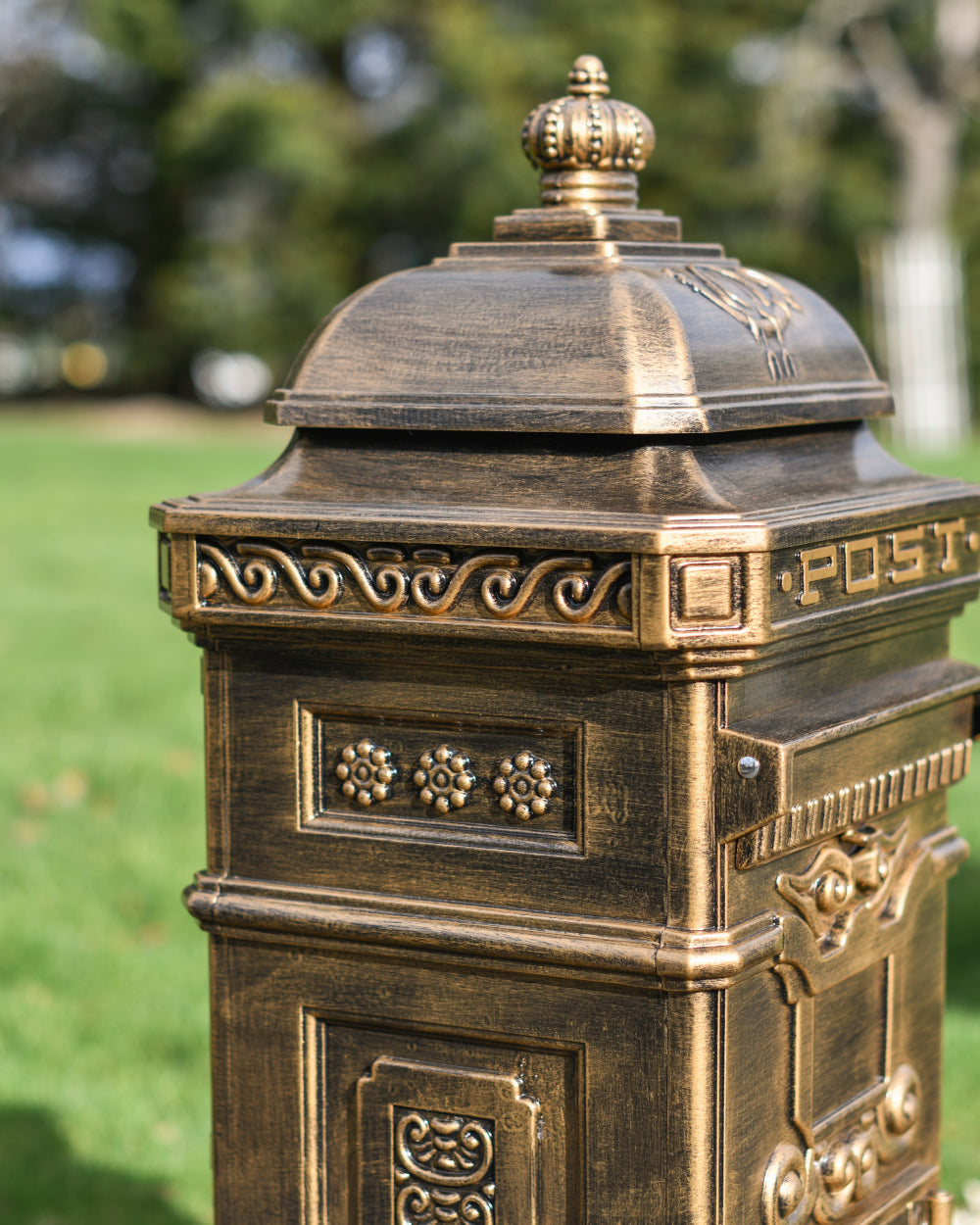 Decorated gold letter box
