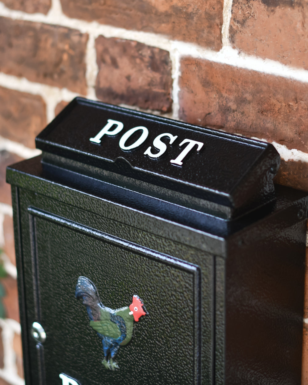 Post box with white lettering 