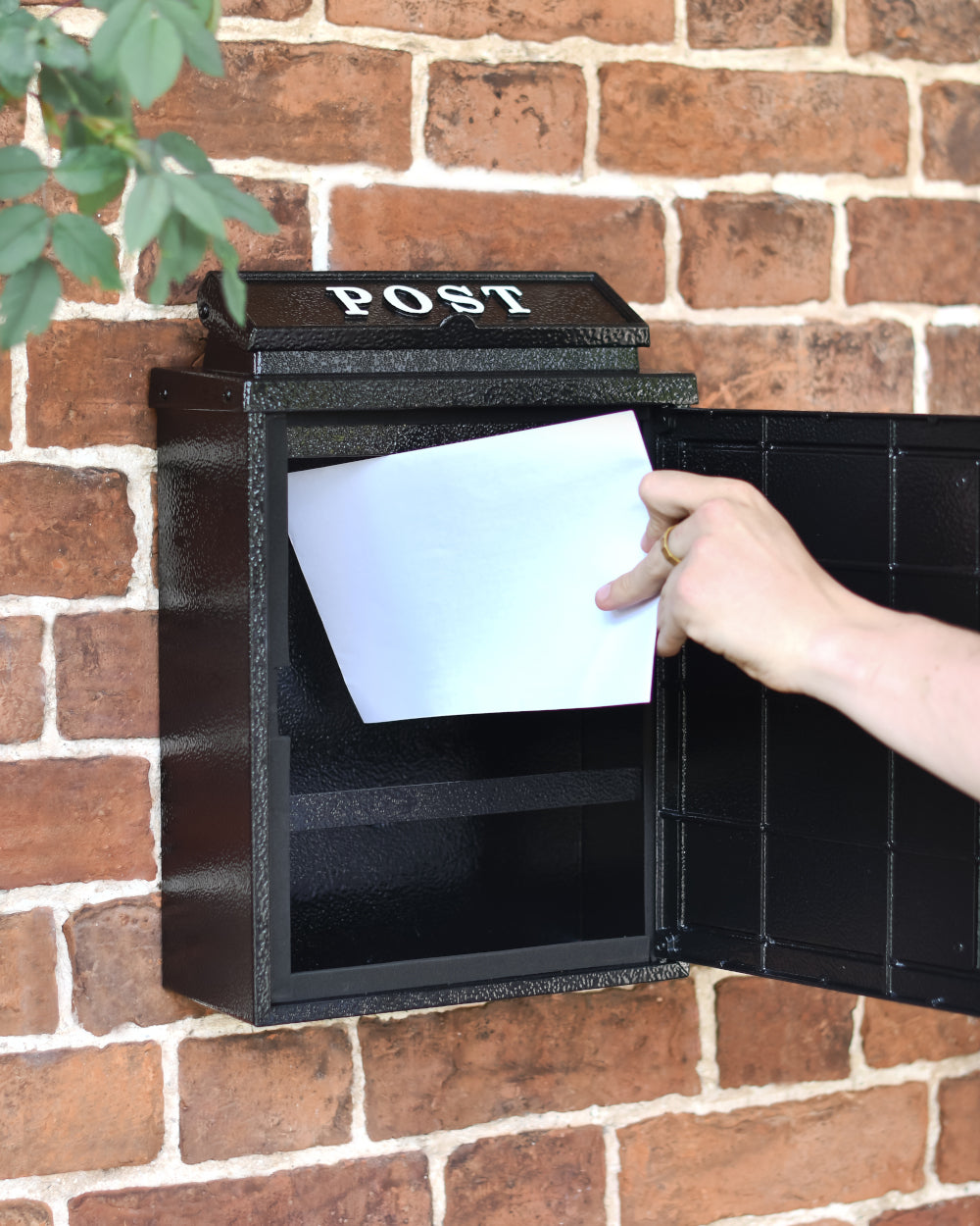 Hinged front door post box 