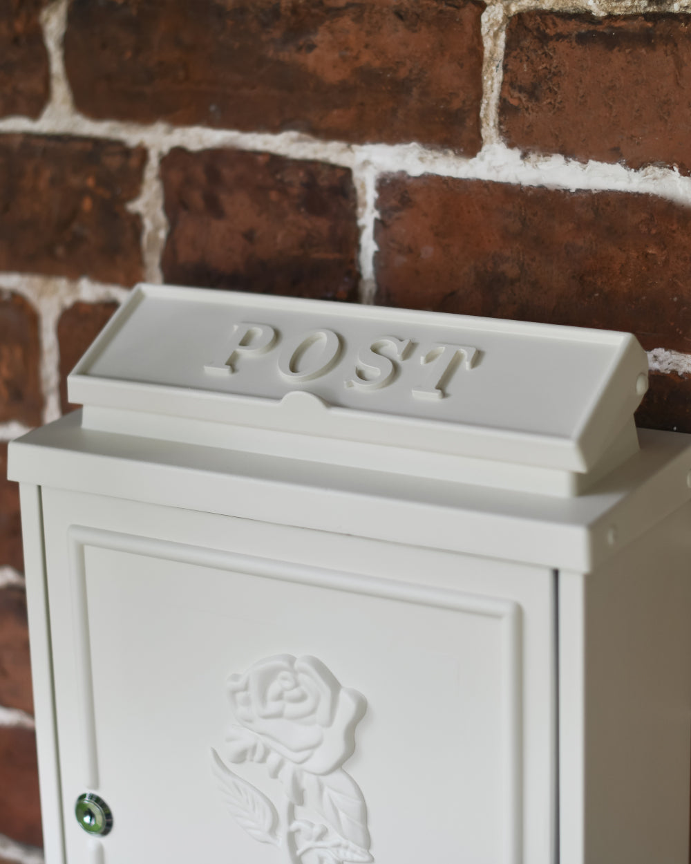 White lettering on letter box flap