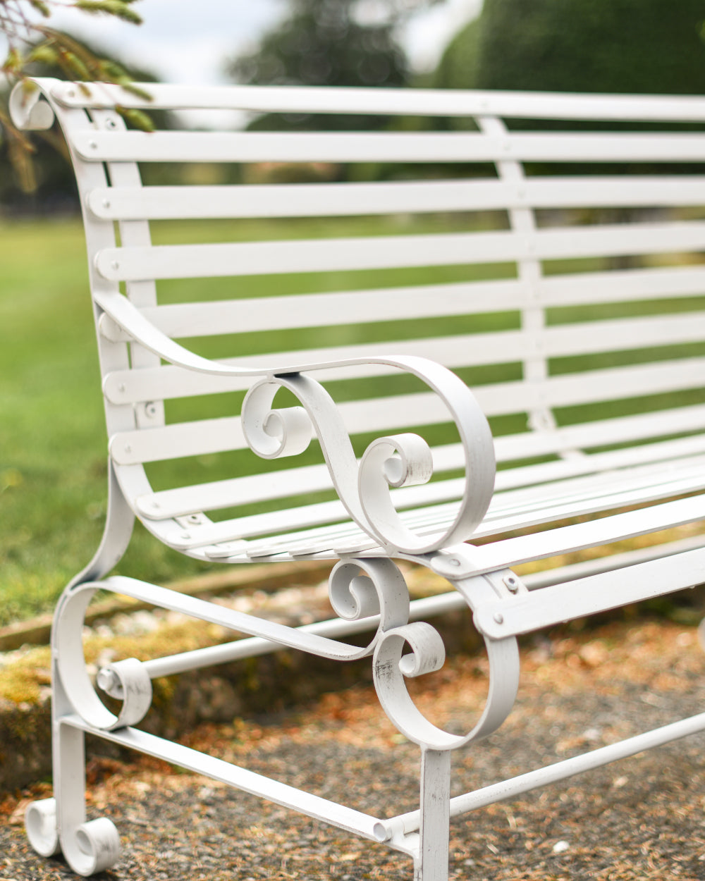Scrolled bench arm rests 