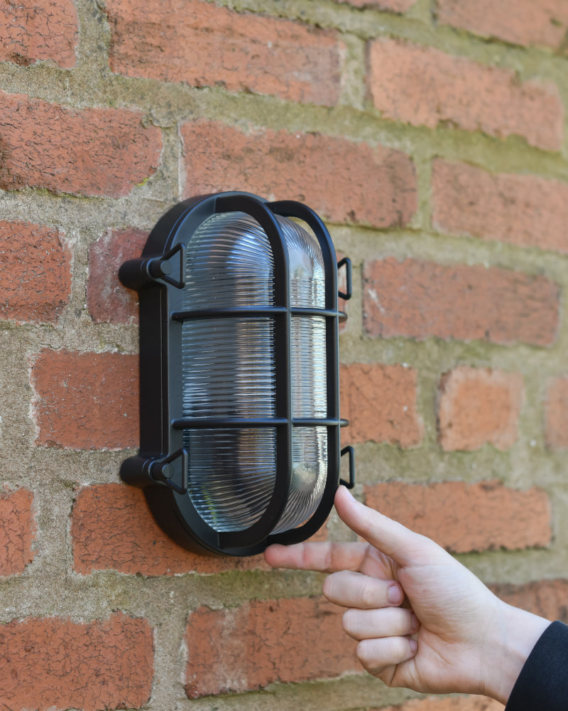 Life size scale of the 'Dunham' Medium Black Maritime Wall Light 