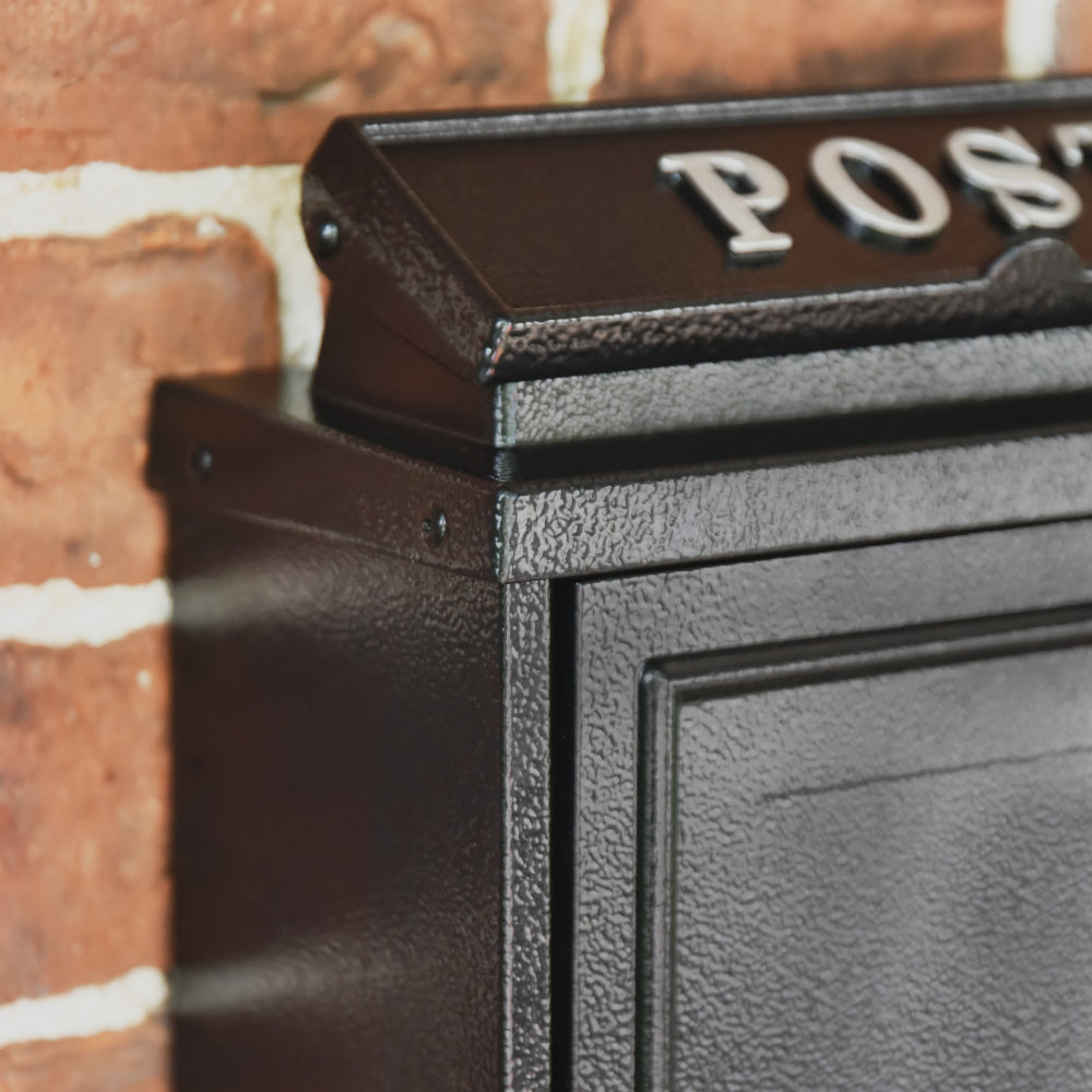 Galvanised edge of the "Norfolk" Wall Mounted Post Box in a Black Finish With Silver Text