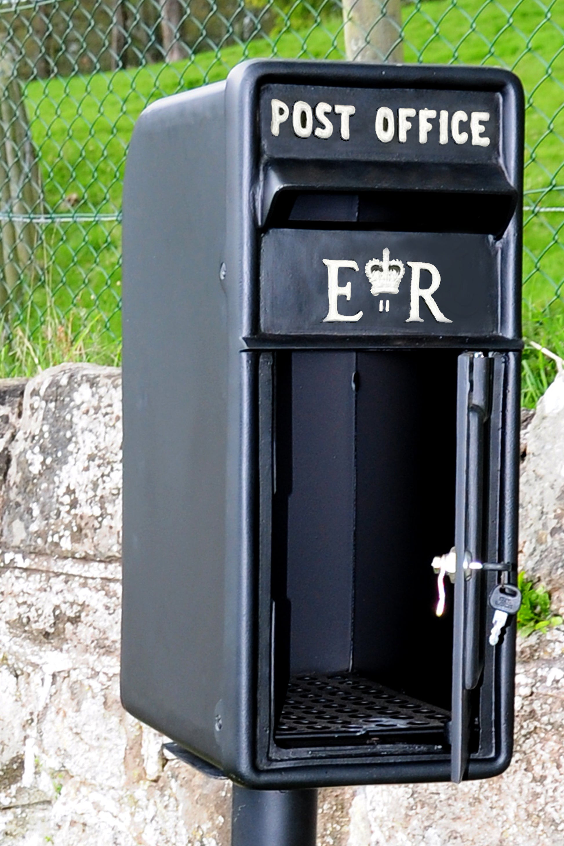 black exterior post box on stand