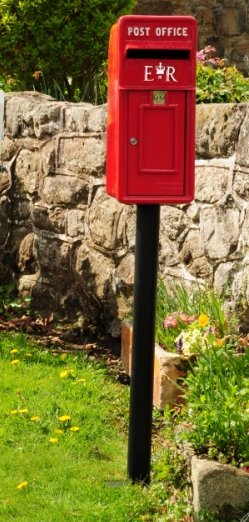 Free standing red traditional ER post box