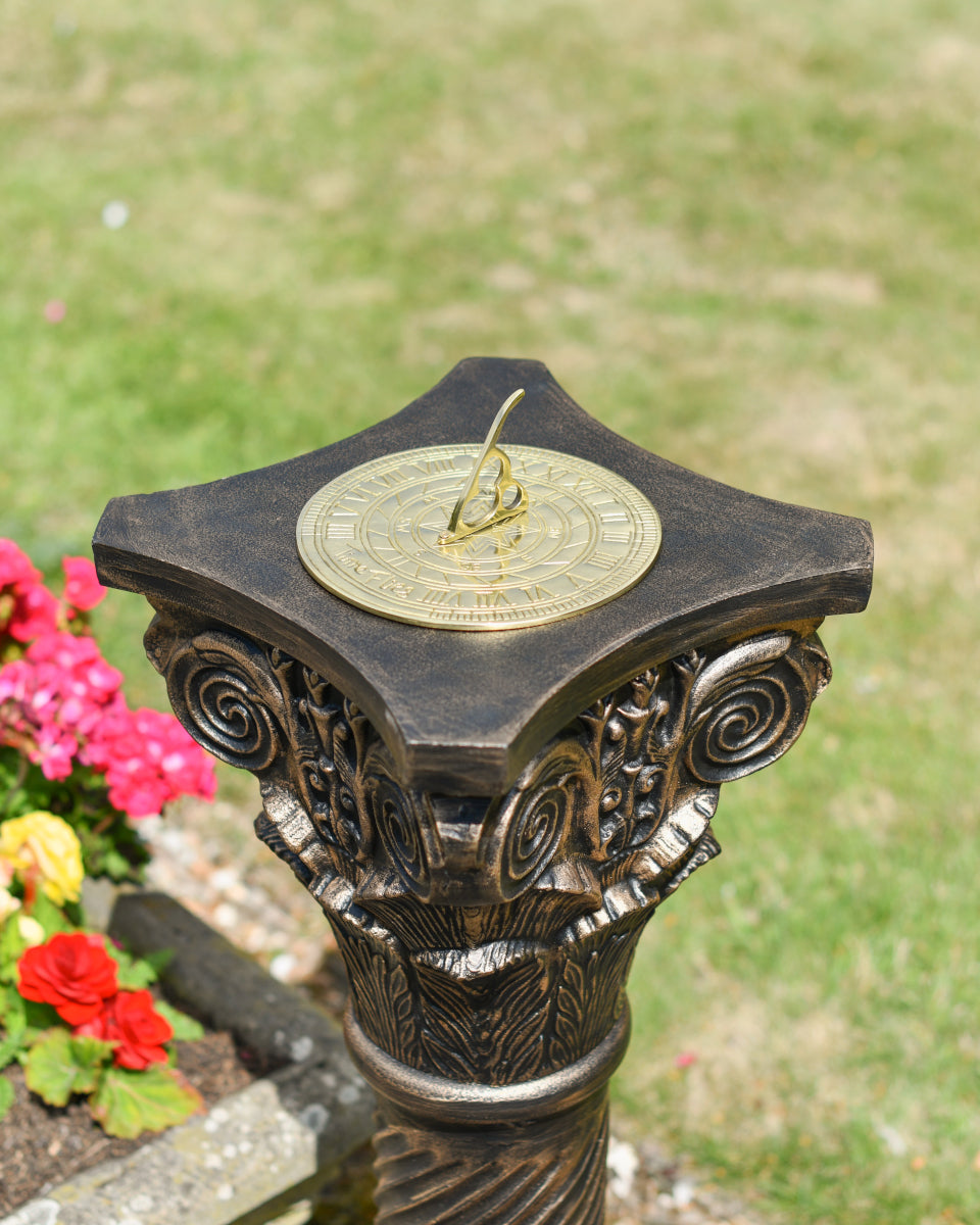 The tall plinth with a sundial placed on it
