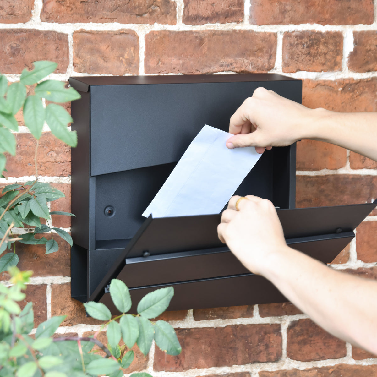 View of someone retrieving their post 