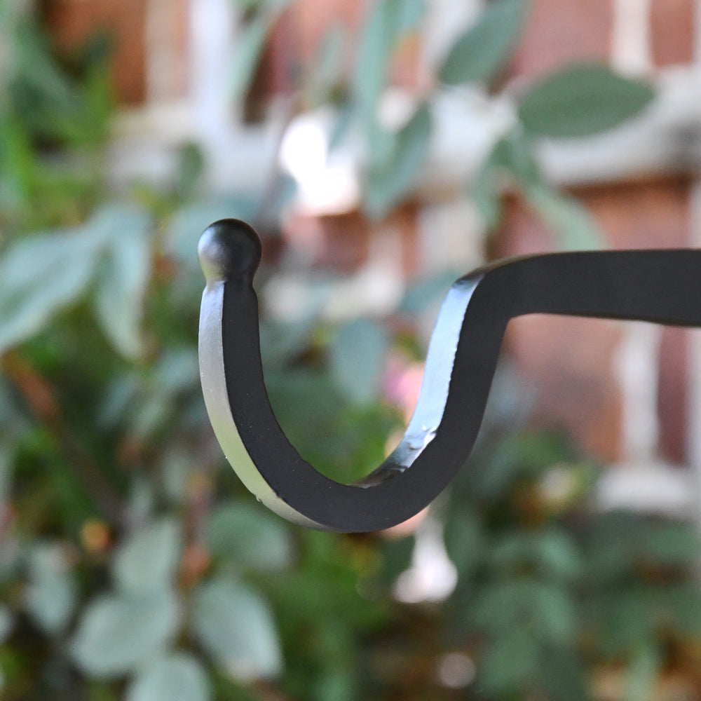 Close up of hanging basket arm